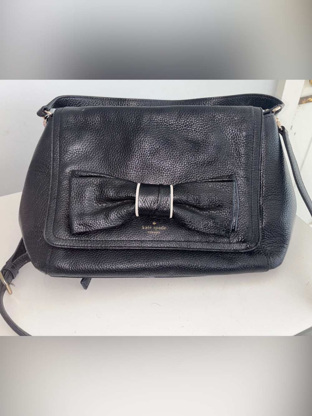kate spade Black Pebbled Leather Messenger with Bow Accent